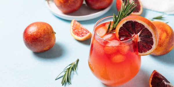 delicious-blood-orange-cocktail-on-light-blue-back-2025-01-09-05-09-30-utc-min